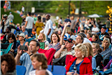 Audience Enjoys a Concert at the Town Green