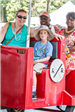 Adults and Children Riding Festival Train