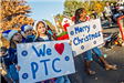 Children Holding Holiday Parade Banners