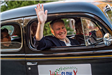 Council Member Waving from Car
