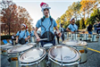 Drummer Marching and Playing in Parade