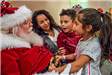 Family Talking to Santa Claus