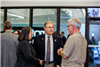 Mayor and Wife Speaking with Man