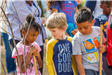 3 Children Holding Shovels