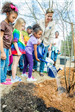Children Watering New Tree