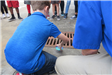 Child Labeling a Storm Drain