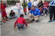 Child Labeling a Storm Drain