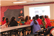 Josh Teaching Students in Cafeteria