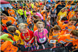 Children in Bright Colors at the Starting Line