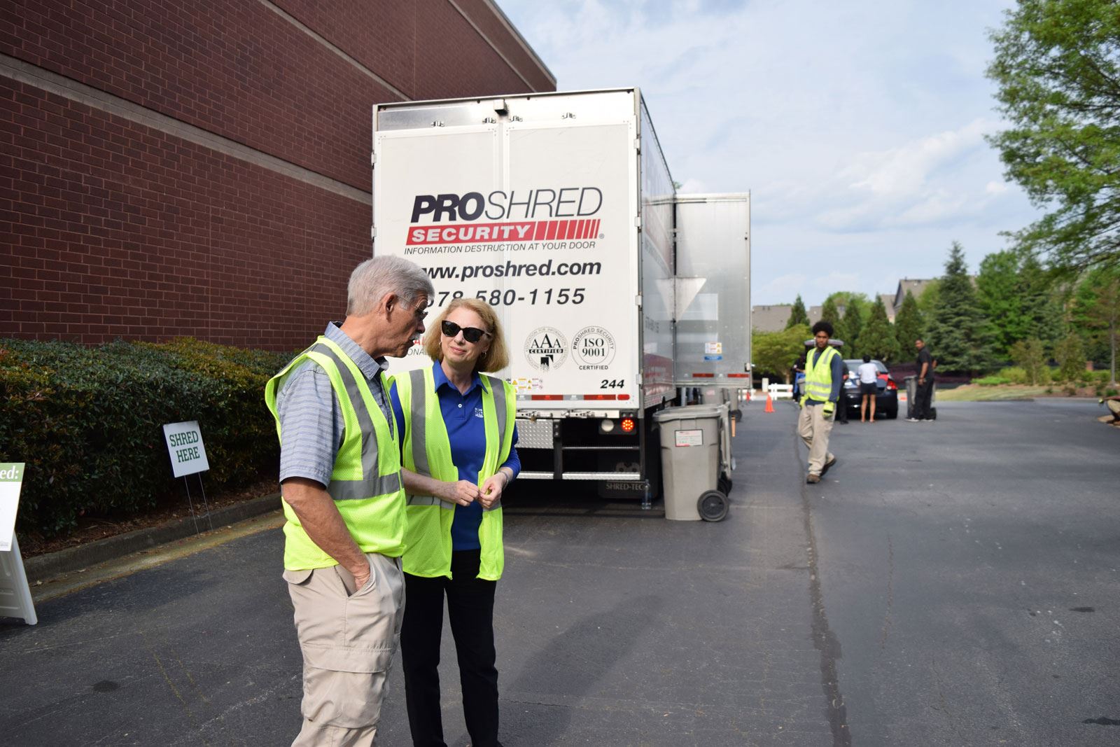 Volunteer Workers Waiting for Cars