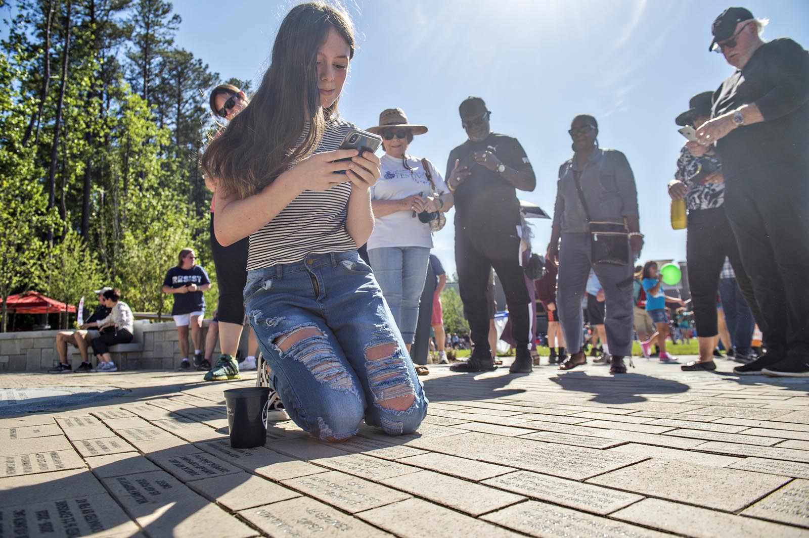 Taking Pictures of Pavers at the Veterans Monument
