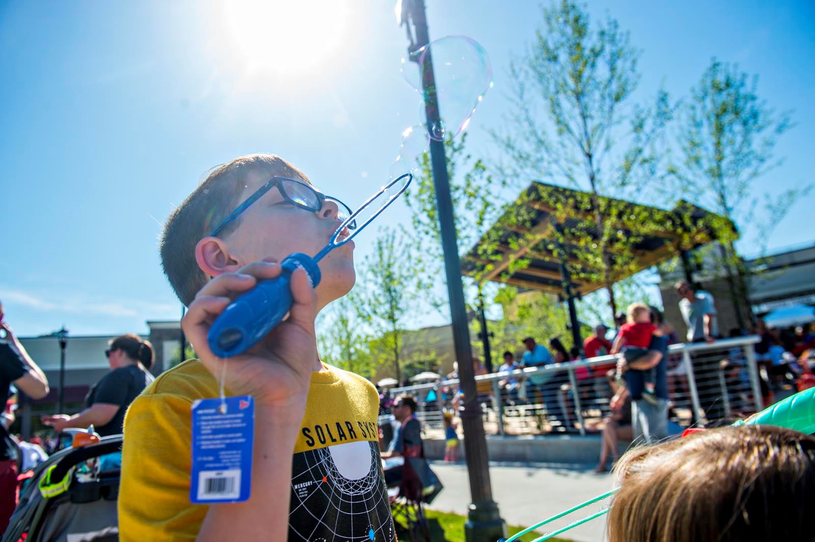 Child Blowing Bubbles