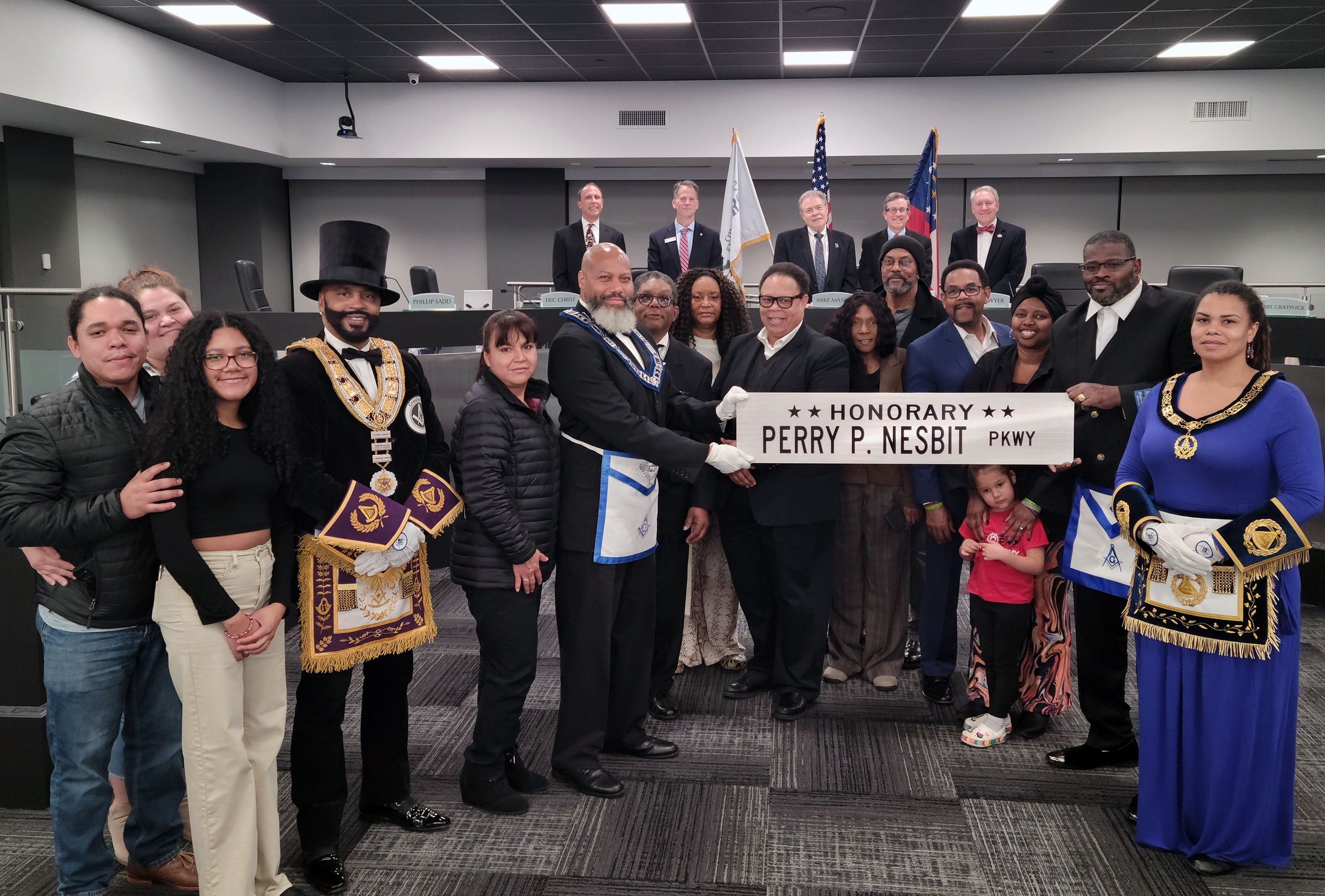 Picture of Nesbit Family with Street Sign
