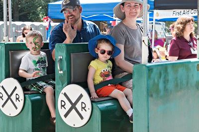 Family Riding in the Festival Train