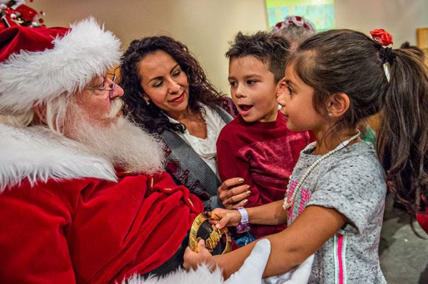 Family Talking to Santa Claus
