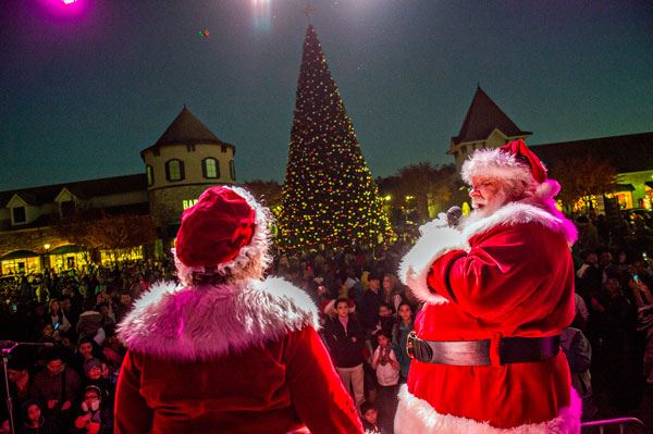 Santa and Mrs. Claus Addressing a Crowd