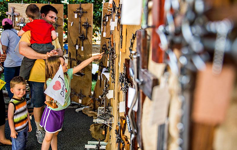 Family Examining Crafts