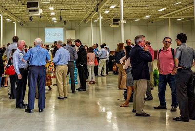 Crowd of People Chatting at Prototype Prime