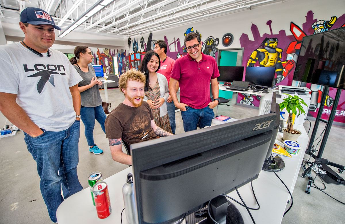 People at a Computer Station