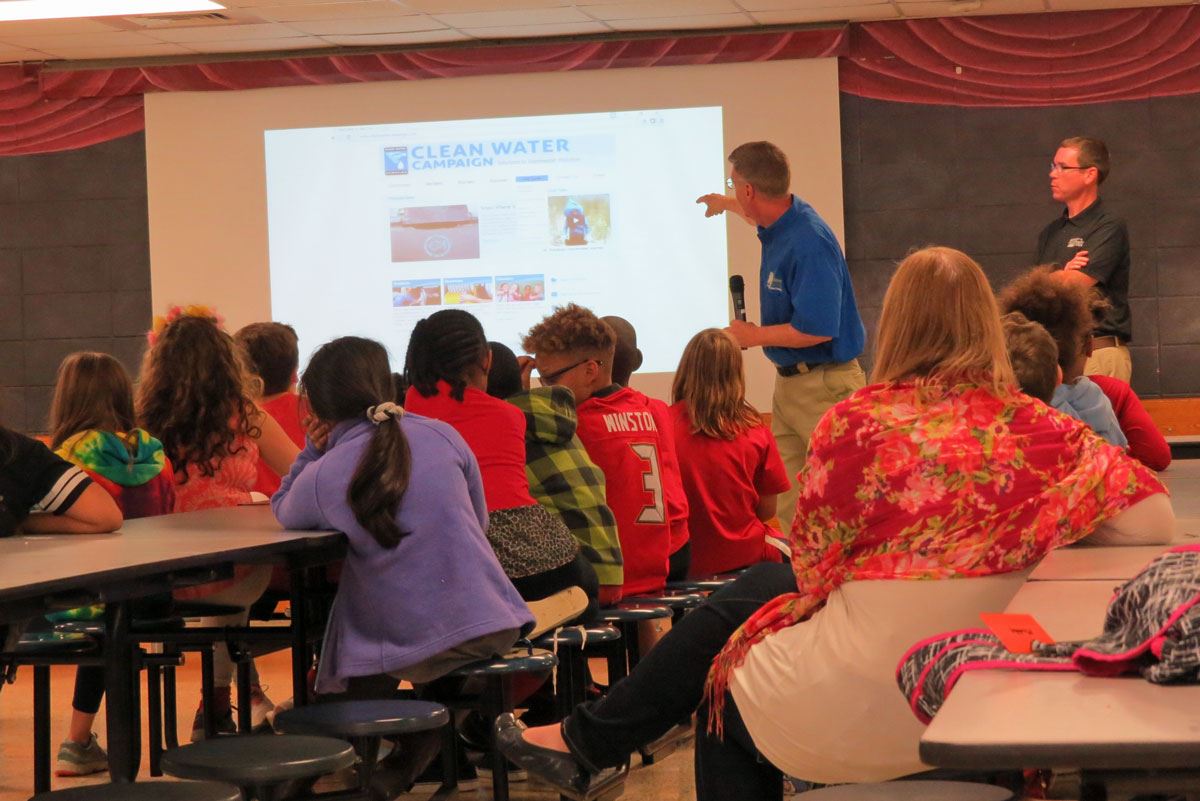 Clean Water Presentation in School Cafeteria