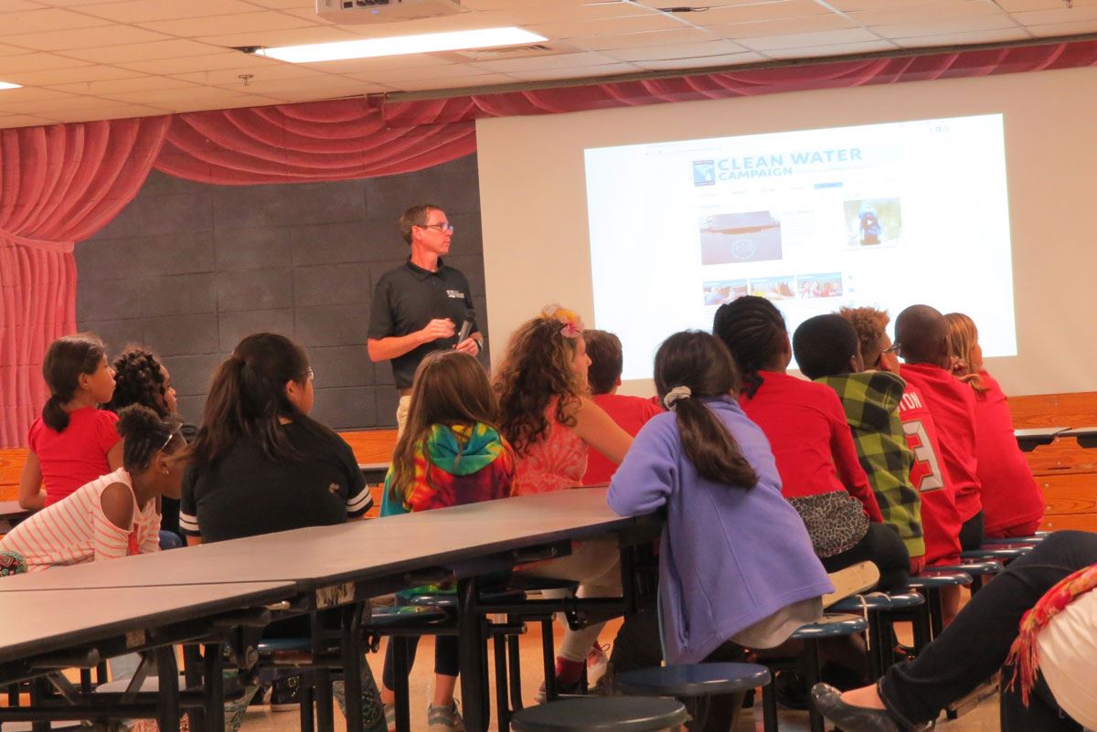 Josh Teaching Students in Cafeteria