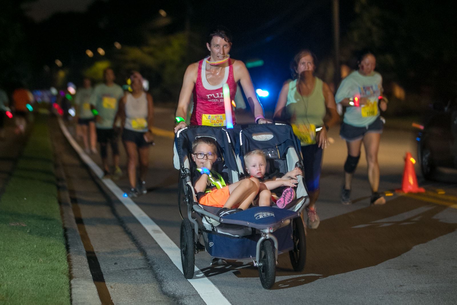 Mother Pushing Children in Stroller