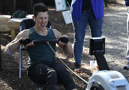 John Aguilar on the rowing machine