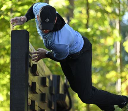 TJ Fox going over the wall