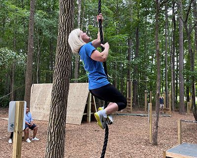 Woman Climbing Rope